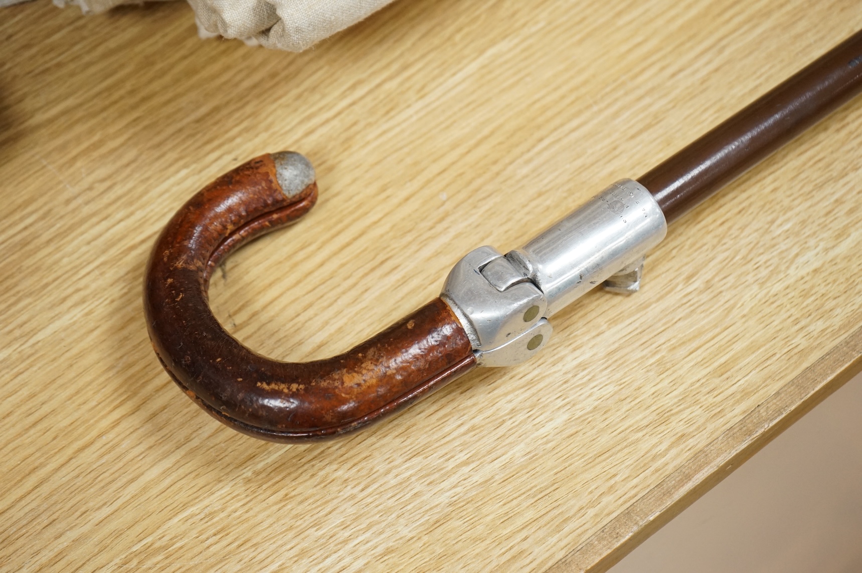 An early to mid 20th century shooting stick, 88cm